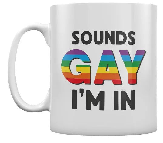 White color-changing mug with rainbow text “SOUNDS GAY I’M IN” on front