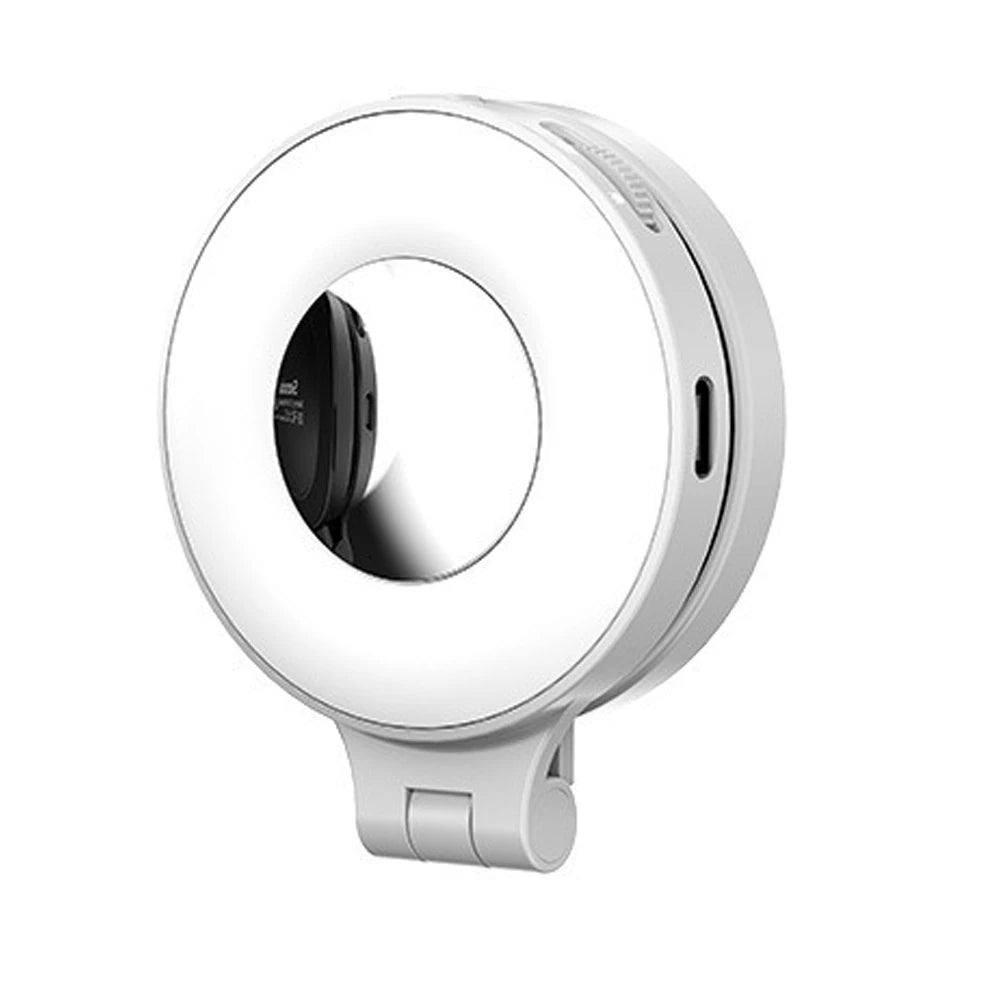 White ring magnetic phone light on a white background