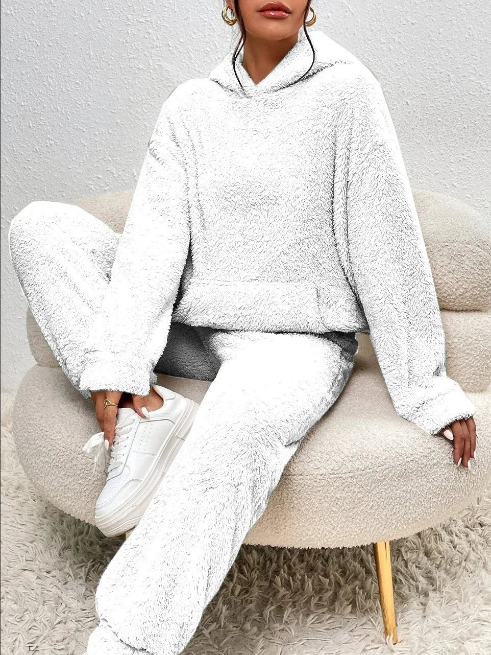 White women's winter plush pajama set with hoodie and matching pants