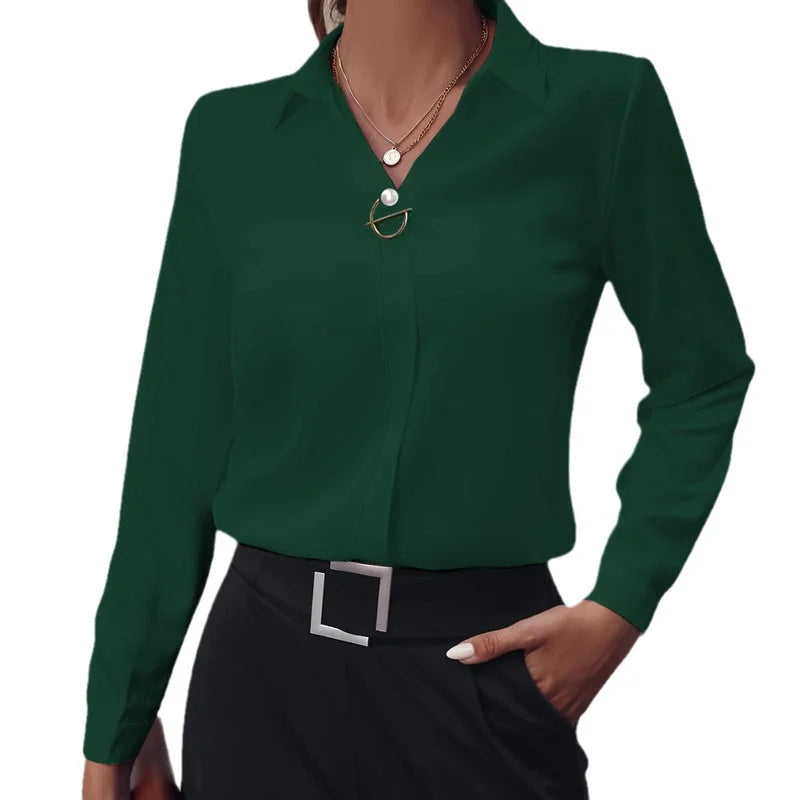 Women’s dark green commuter V-neck blouse paired with black trousers
