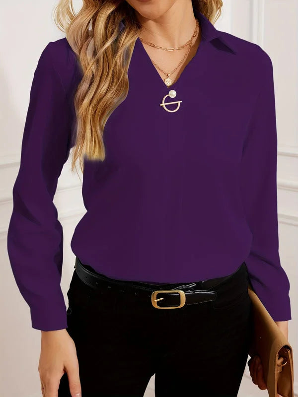 Women’s purple commuter V-neck blouse matched with dark pants