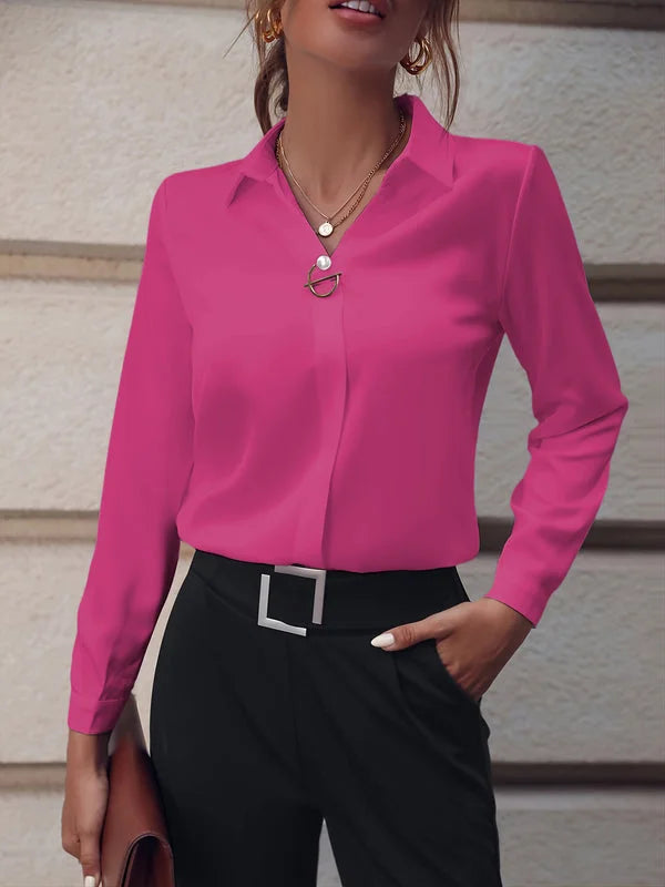 Women’s rose red commuter blouse shown with tailored black bottoms