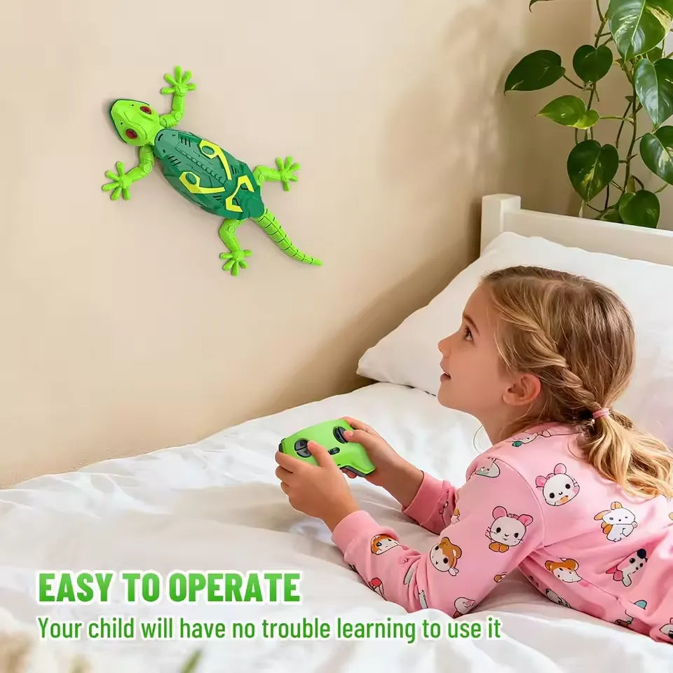 Young girl easily operating remote control gecko toy from bed demonstrating simple user-friendly controls