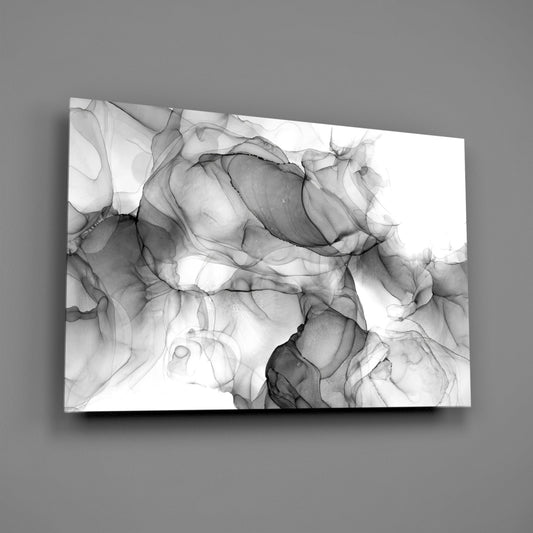 Gray ink swirl glass wall art on a gray wall, light reflecting off the glossy front