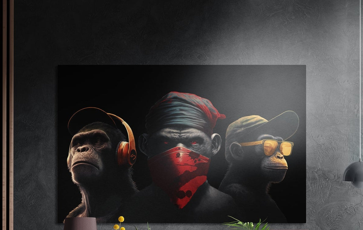 Chimp trio in headphones, red bandana and gold sunglasses brushed aluminum wall art on a dark textured wall above plant tops