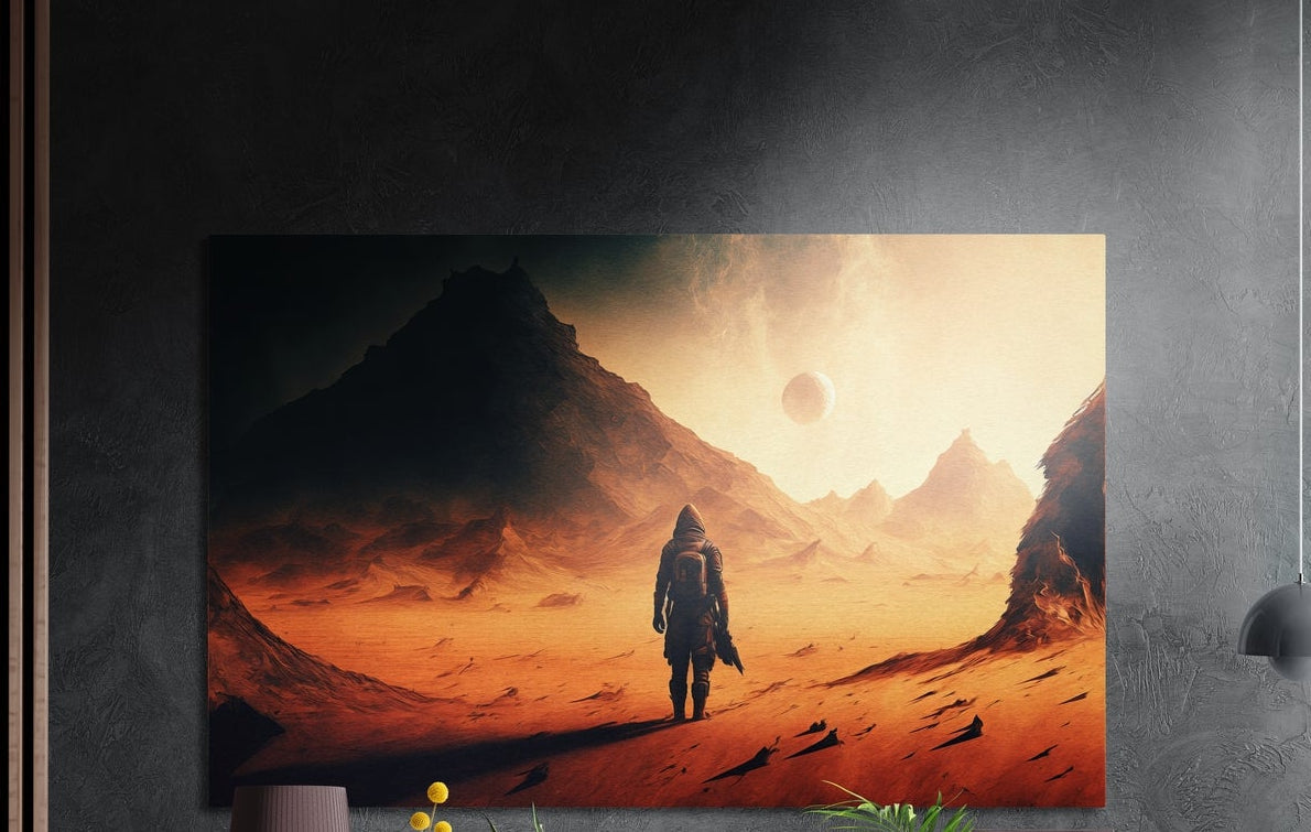 Wanderer on a desert planet brushed aluminum wall art on a gray concrete wall with a lamp and plants below