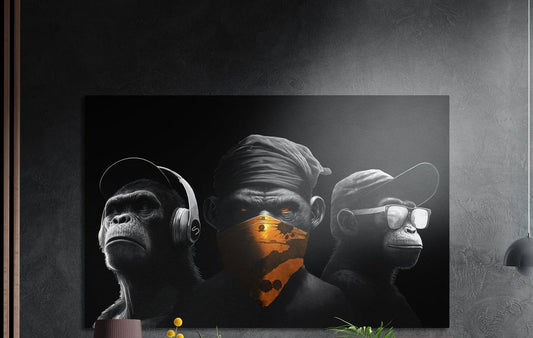 Three chimps in headphones, an orange bandana and sunglasses, brushed aluminum wall art on a dark textured wall