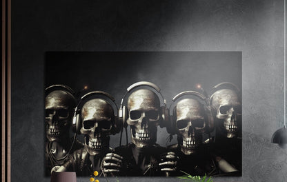 Row of skulls wearing headphones brushed aluminum wall art on a gray concrete wall with a lamp and plants below