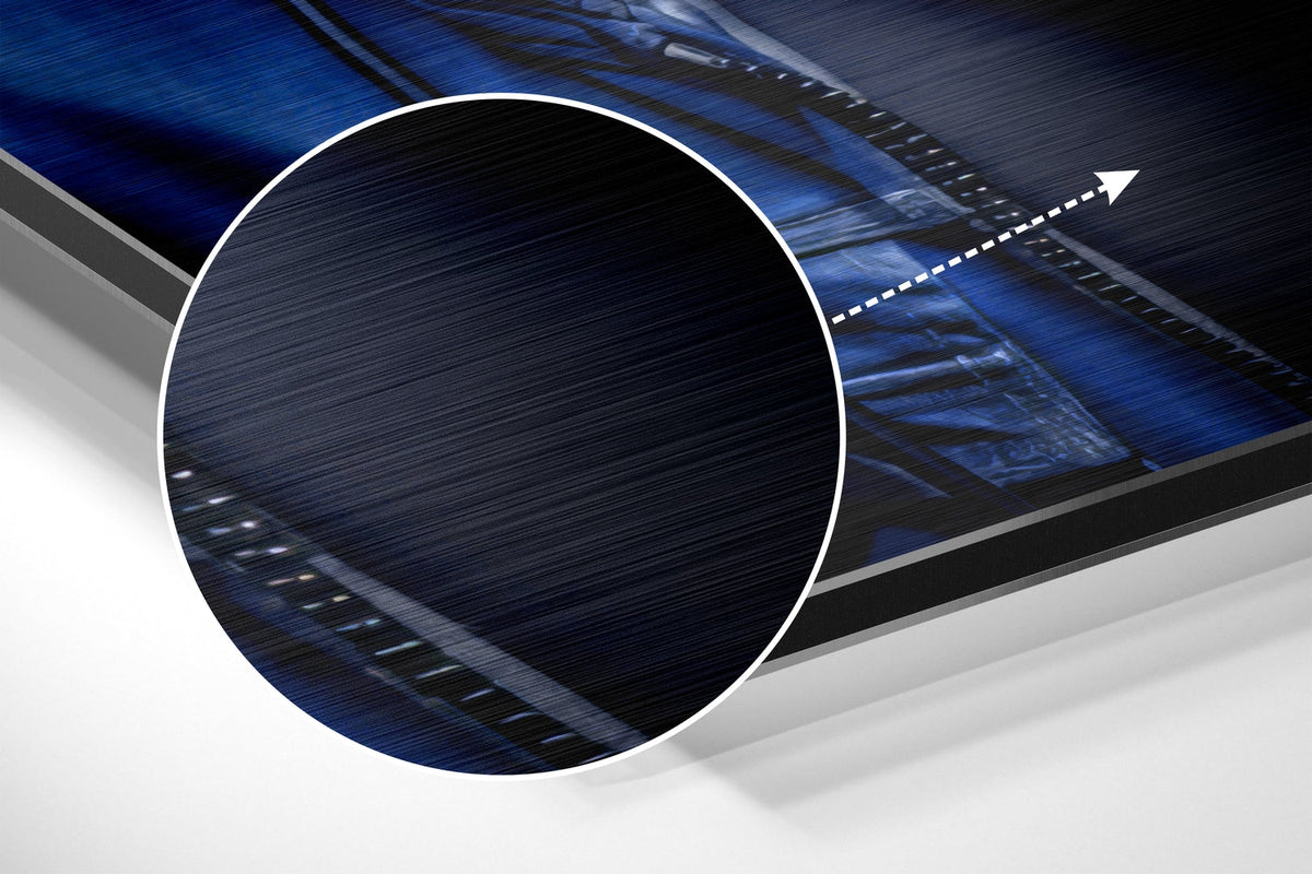 Magnified detail of the brushed metal grain showing through the blue hoodie DJ gorilla print