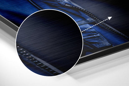 Magnified detail of the brushed metal grain showing through the blue hoodie DJ gorilla print