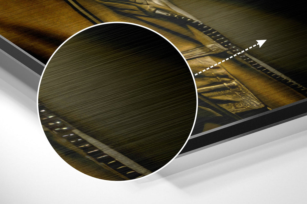 Magnified detail of the brushed metal grain showing through the mustard hoodie DJ gorilla print