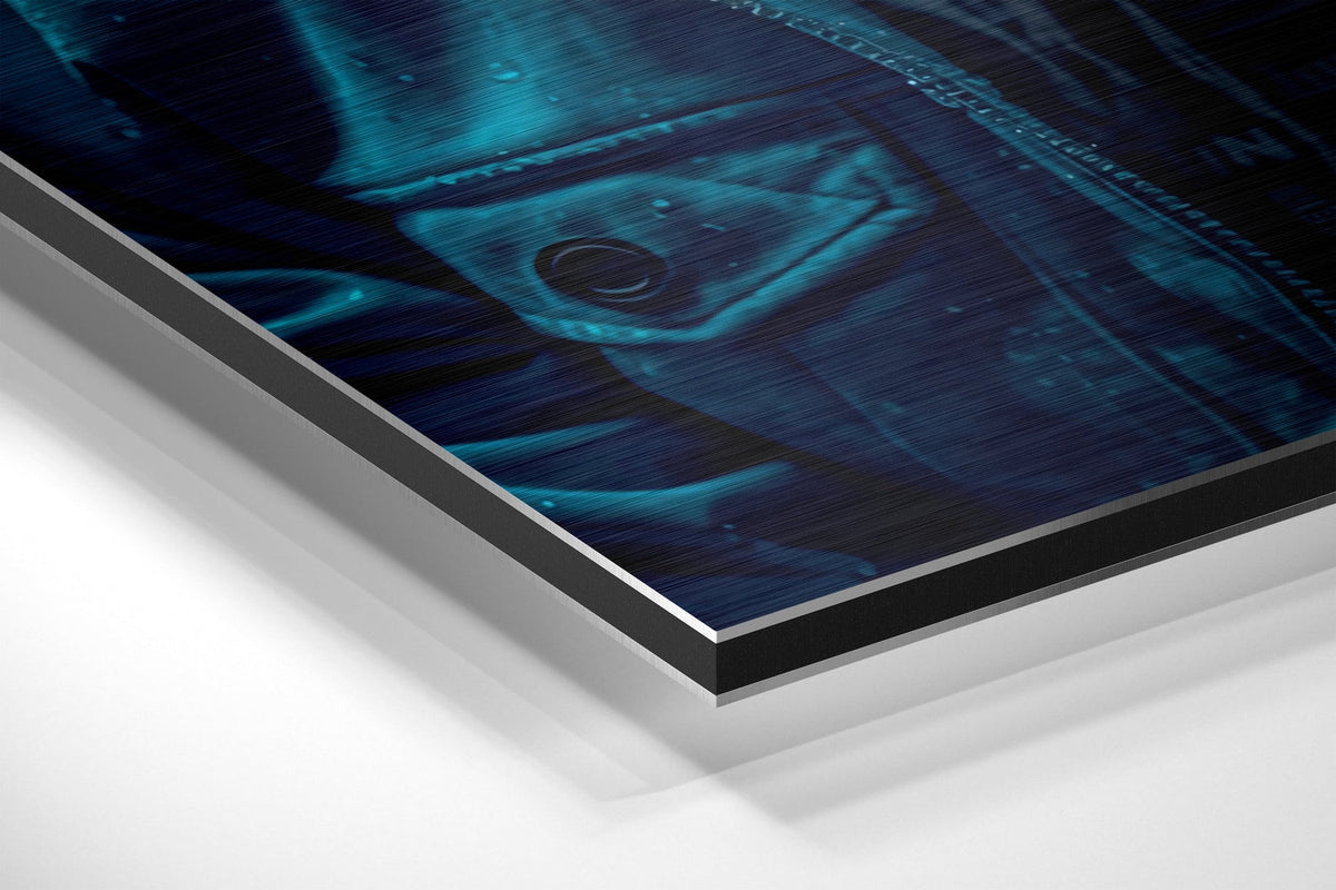 Teal hoodie gorilla with headphones brushed aluminum panel corner close-up showing the brushed metal grain