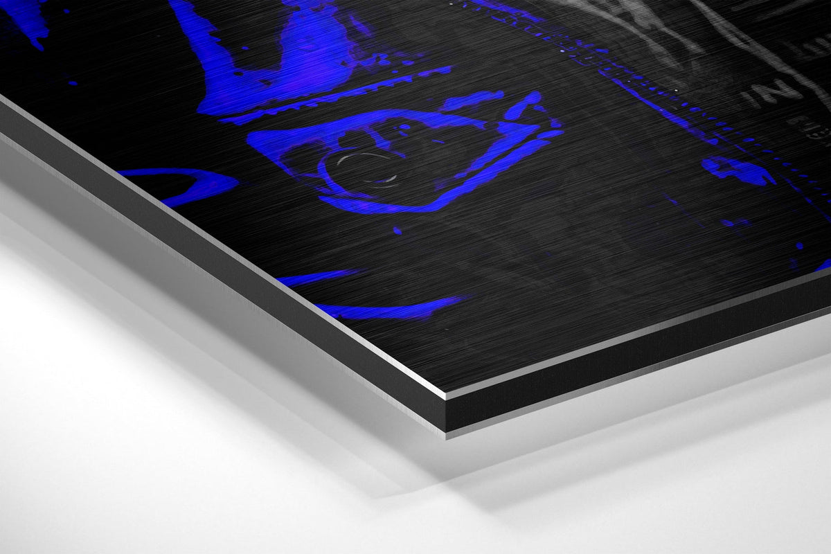 Electric blue hooded gorilla in headphones brushed aluminum panel corner close-up showing the brushed metal grain
