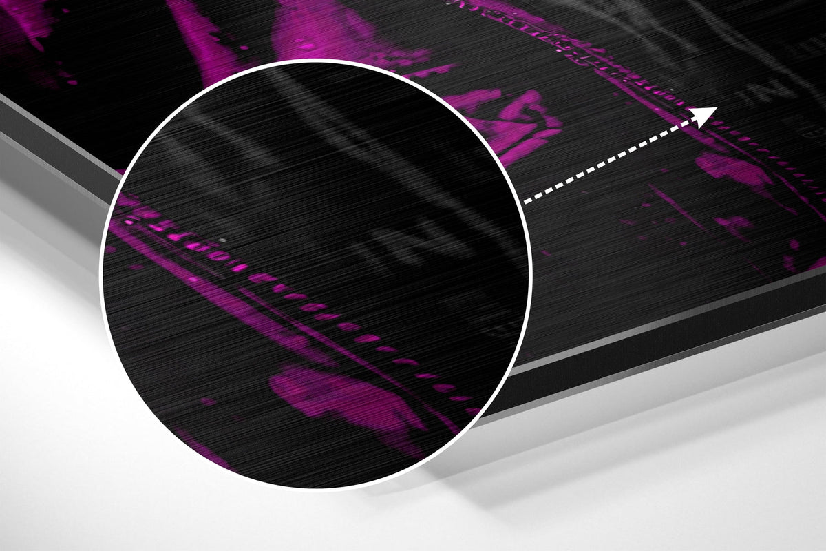 Magnified detail of the brushed metal grain showing through the magenta hooded DJ ape print
