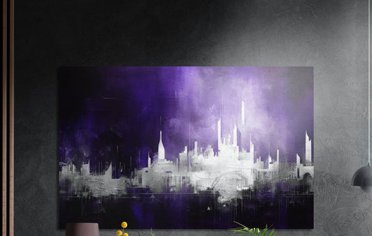 Purple haze city skyline brushed aluminum wall art on a dark textured wall, a lamp and plant tops below