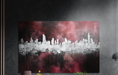 Burgundy reflected city skyline brushed aluminum wall art on a dark textured wall beside wood slats and a lamp