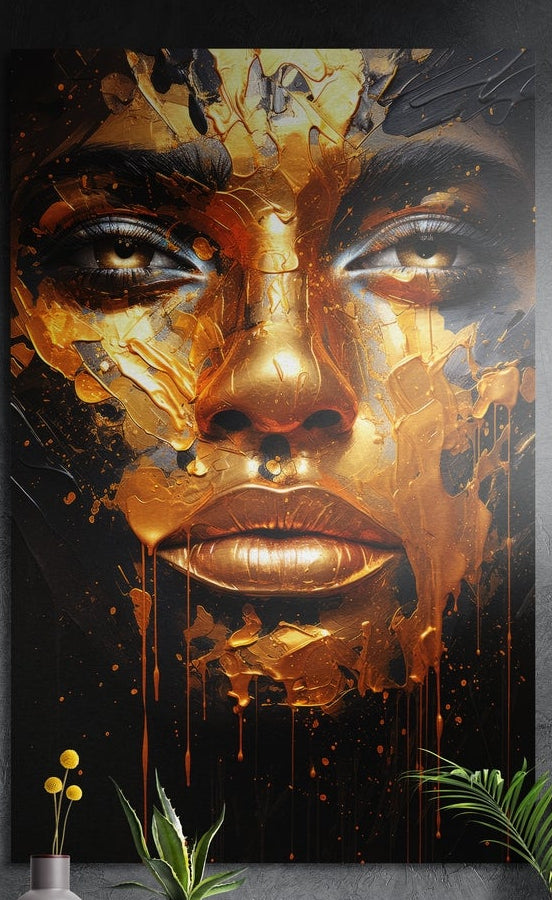 Woman face in layered gold and copper paint with drips, brushed aluminum wall art on a dark wall above a gray vase and leaves