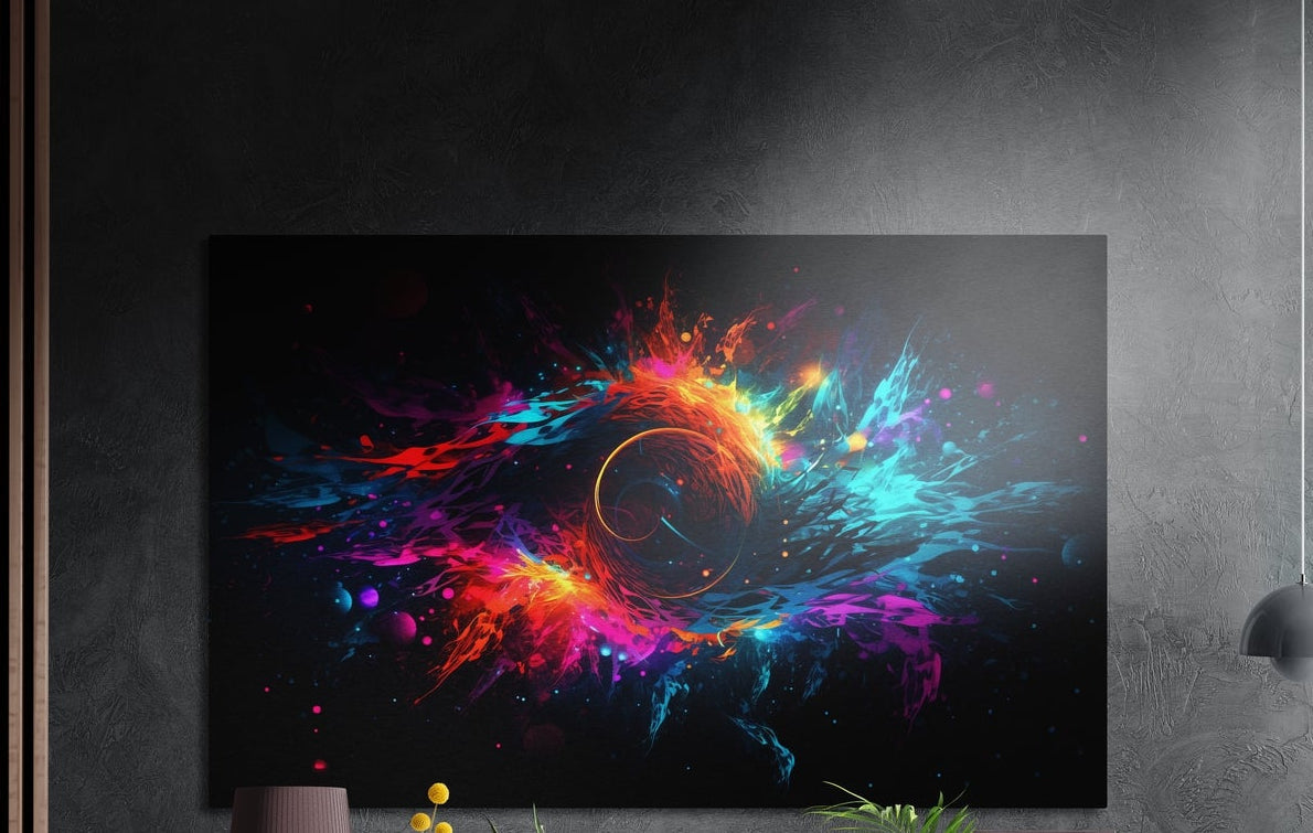 Neon pink, orange and blue paint splashes swirling around a ring on black, brushed aluminum wall art on a dark textured wall