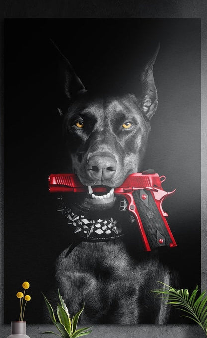 Black Doberman with a red pistol in its mouth, brushed aluminum wall art on a dark wall above a vase and plants