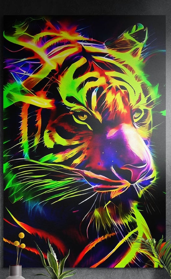 Neon rainbow tiger face on black, brushed aluminum wall art on a gray wall above a vase and plants