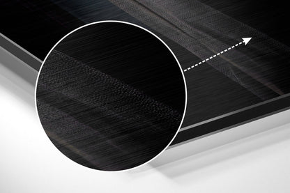 Magnified detail of the brushed metal grain showing through the gorilla detective in fedora print