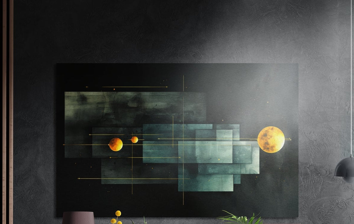Geometric panels and planets brushed aluminum wall art in teal and gold on a dark gray wall above a mauve lamp and plants