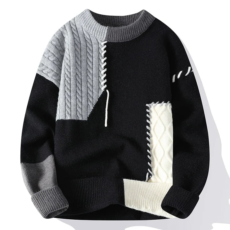 black and gray block knit sweater with white accents
