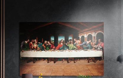Jesus and twelve apostles at a long white supper table, brushed aluminum wall art on a dark wall above a sideboard