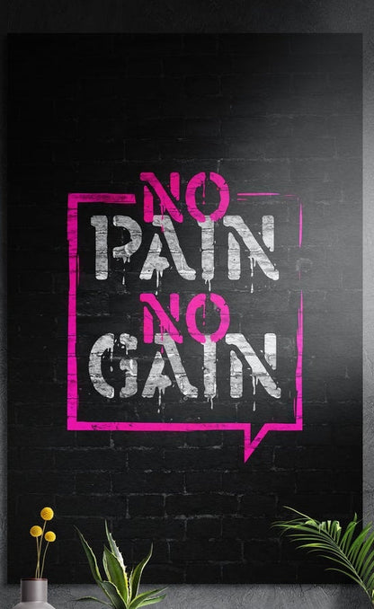 No pain no gain pink stencil on brick brushed aluminum wall art on a dark textured wall above potted plants