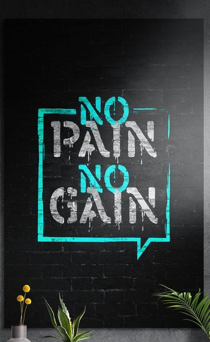 No pain no gain turquoise stencil lettering on black brick brushed aluminum wall art above a vase and potted plants
