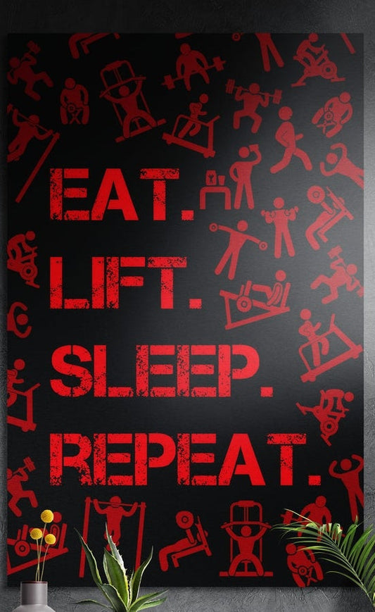 Red gym icons and routine words brushed aluminum wall art on a dark gray wall above yellow flowers and plants