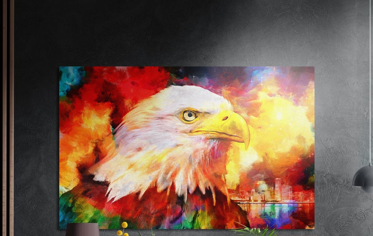 Bald eagle in rainbow clouds brushed aluminum wall art on a dark wall above a sideboard with yellow flowers