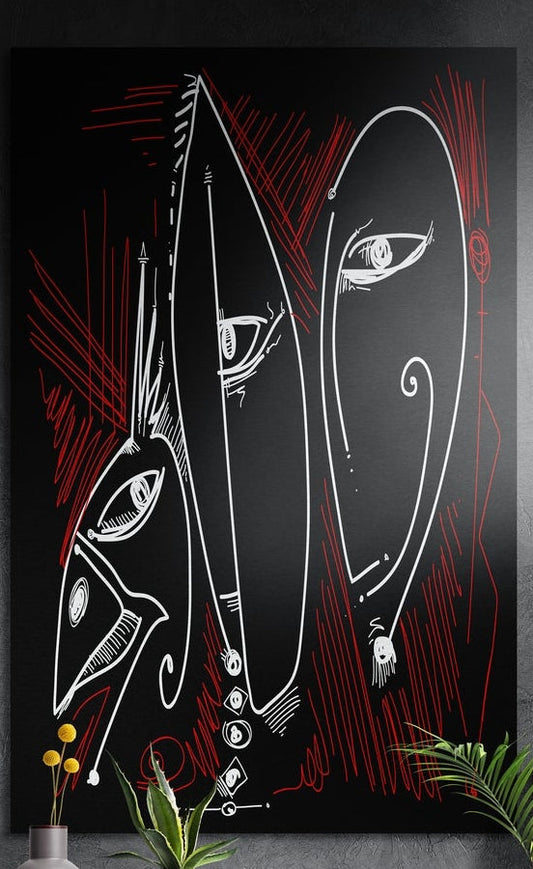 Three white line-drawn faces with red scratches on black, brushed aluminum wall art on a dark gray wall above plants
