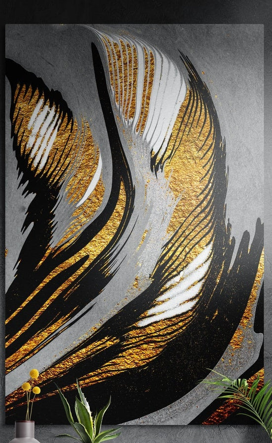 Black and gold sweeping feather strokes brushed aluminum wall art on a gray wall above yellow flowers