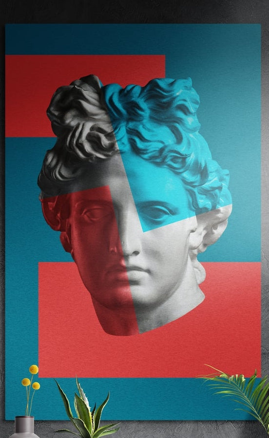 Classical bust on red and teal color blocks brushed aluminum wall art on a gray wall above yellow flowers and plants