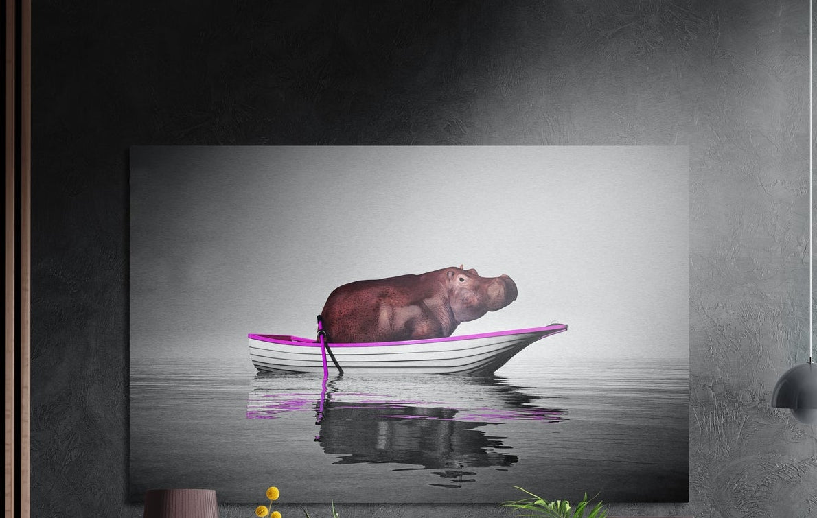 Hippo in a rowboat brushed aluminum wall art in gray with a pink accent on a dark textured wall