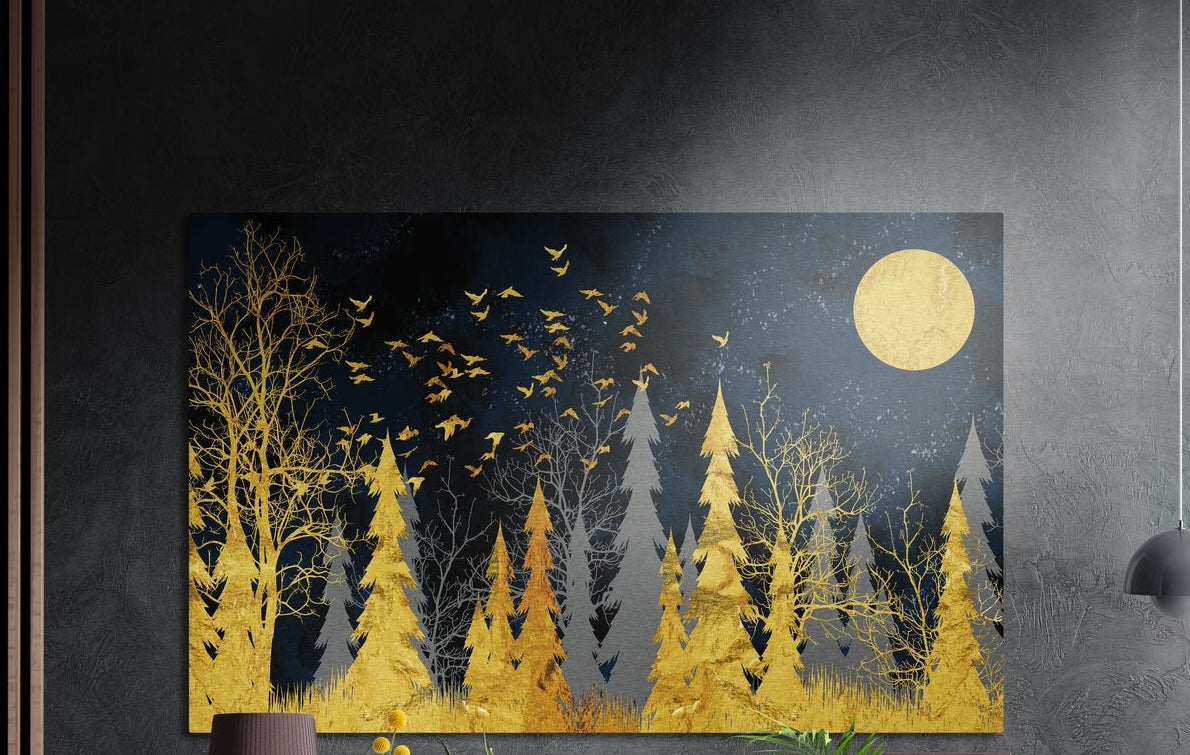 Golden forest brushed aluminum wall art on a dark gray wall above a sideboard with a vase and plants