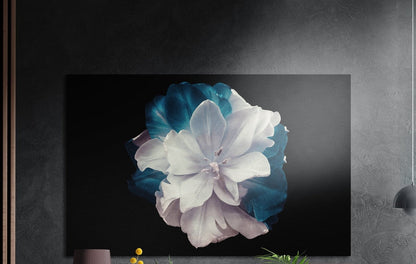 White and teal bloom brushed aluminum wall art on a dark textured wall beside a gray pendant lamp