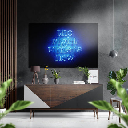 The Right Time Is Now metal wall art hanging in an office