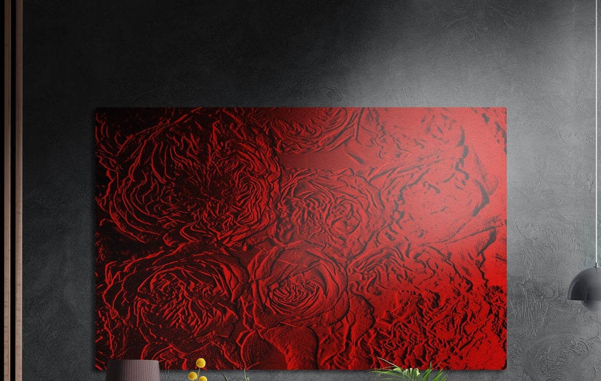 Red rose pattern brushed aluminum wall art on a dark gray wall beside a black wall lamp