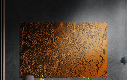 Copper rose pattern brushed aluminum wall art on a dark gray wall beside a black wall lamp