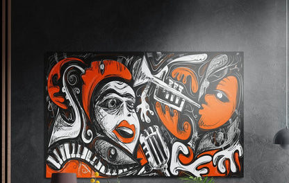 Orange jazz faces and piano keys brushed aluminum wall art on a dark textured wall above potted plant tops