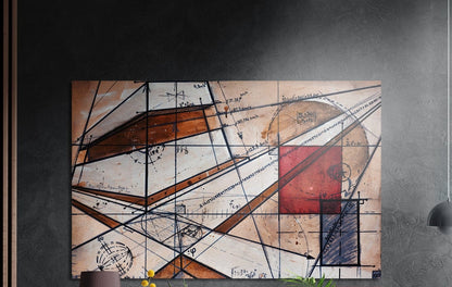 Geometric line sketch in brown, red and navy brushed aluminum wall art on a dark gray concrete wall