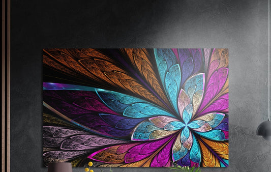 Jewel tone fractal flower brushed aluminum wall art on a dark gray wall beside a black wall lamp