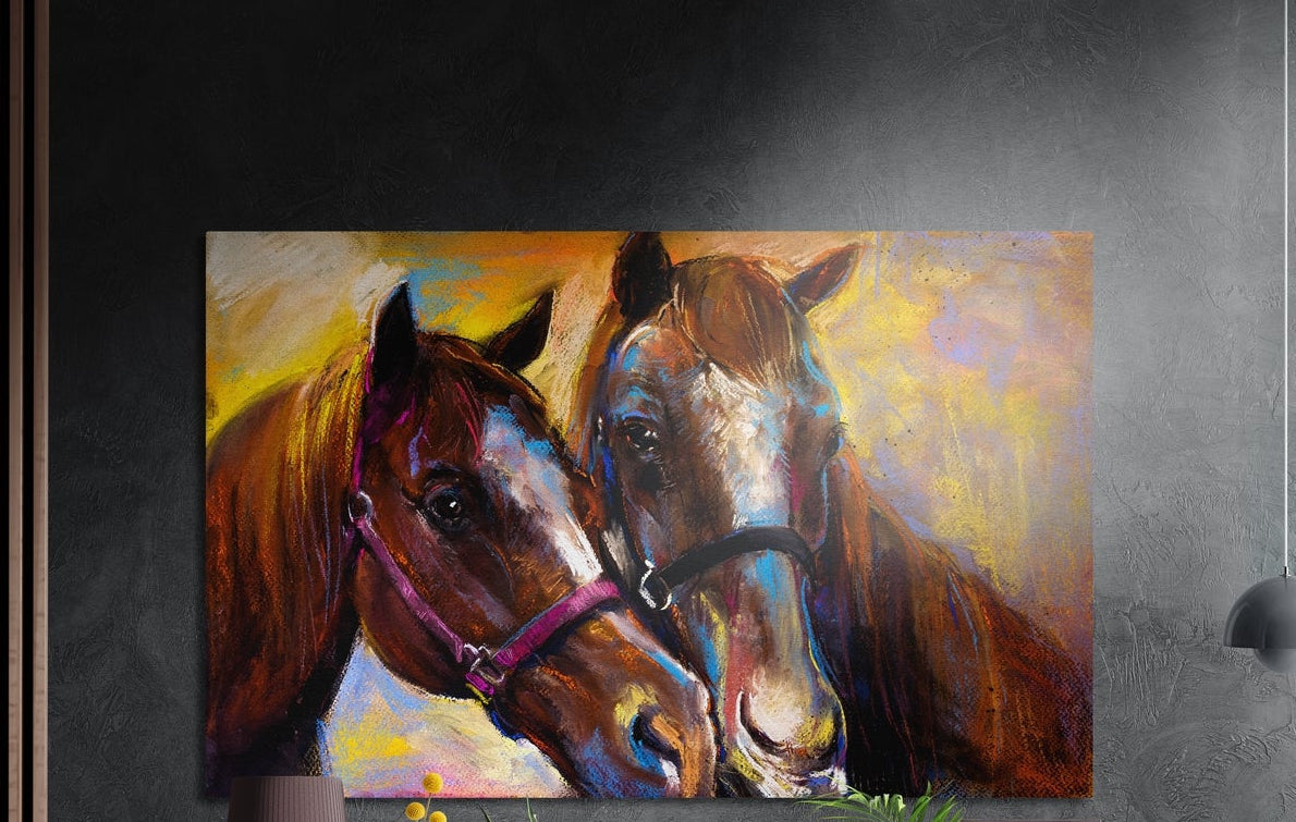 Two brown horses with halters, heads together, in brown, blue and yellow strokes, brushed aluminum wall art on a dark wall