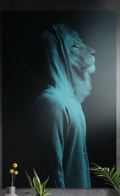 Lion in a teal hoodie shown in profile brushed aluminum wall art on a dark gray wall above plants