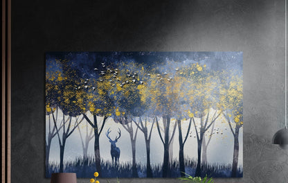 Stag silhouette among trees with gold and navy treetops brushed aluminum wall art on a dark gray wall above plants