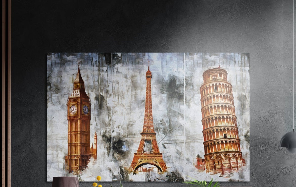 London clock tower, Eiffel Tower and Leaning Tower of Pisa on gray, brushed aluminum wall art on a dark wall
