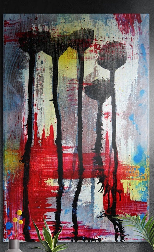 Dark flowers on dripping stems over red and yellow strokes, brushed aluminum wall art behind yellow billy buttons