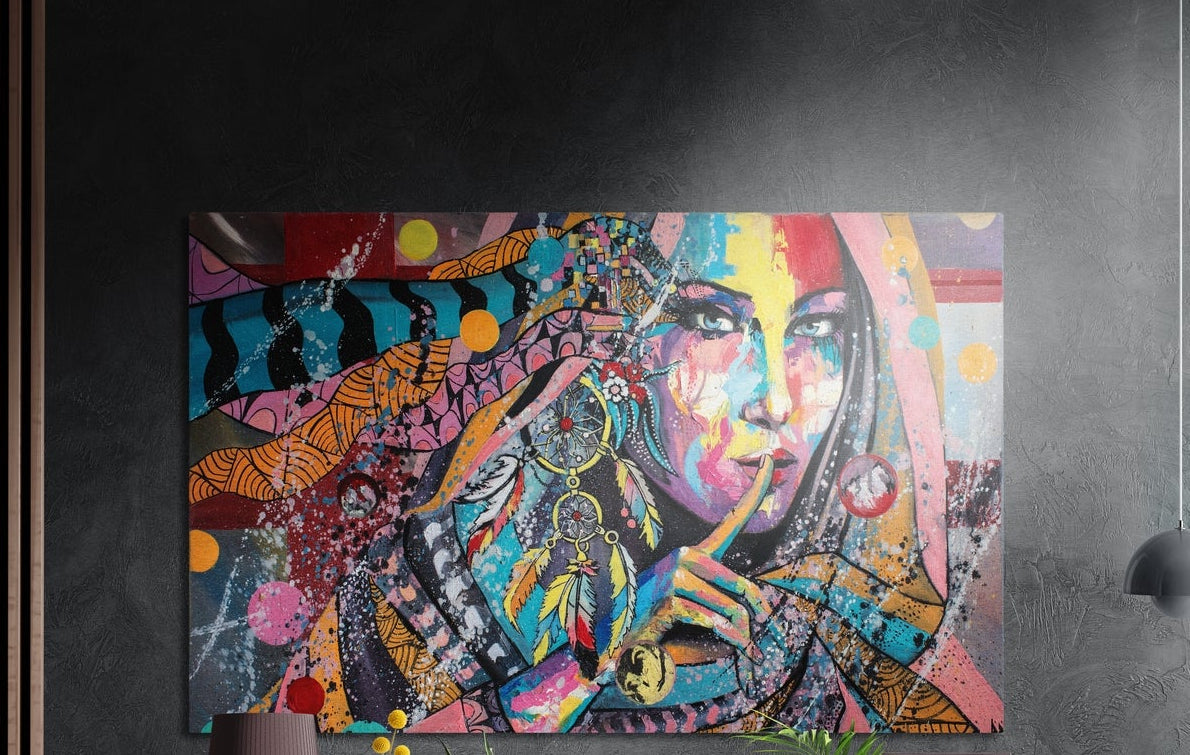 Pop art woman with finger to her lips and a dreamcatcher in bright color, brushed aluminum wall art on a dark textured wall